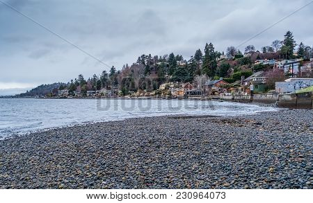A View Of Homes Along The Shoreline In West Seattle, Washington.
