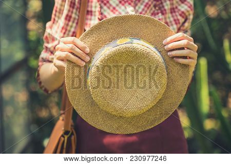 Old Fashion Women Holding Rattan Hat To Go Outdoor Summer Travel Vintage Colortone