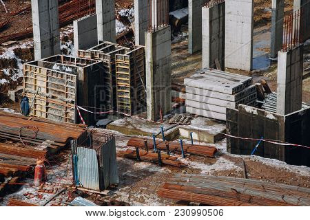 Machinery And Bulldozer With Ground And Beam At Building Contstruction Site On Background Of Dirty G