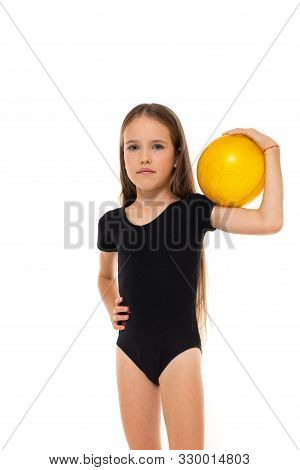 Picture Of A Gymnast Girl In White Crusty Socks And Black Trico Full Height Stands With Yellow Ball 