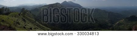 Panorama Over The Green Lush Tea Plantations In Munnar, India