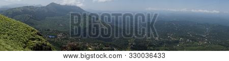 Panorama Over The Green Lush Tea Plantations In Munnar, India