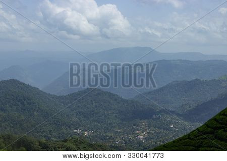Panorama Over The Green Lush Tea Plantations In Munnar, India
