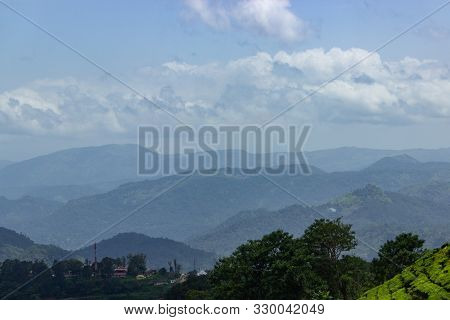 Panorama Over The Green Lush Tea Plantations In Munnar, India