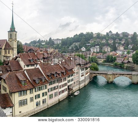 Bern, Switzerland. Untertorbrucke, Nydegg Church In Old City Over The Aare River