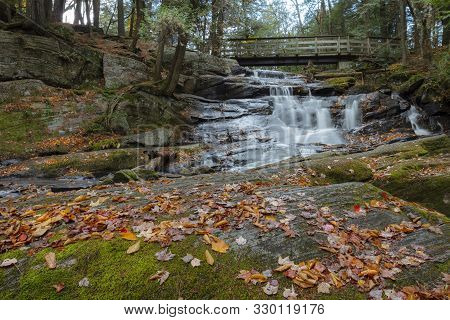 The Strong Flow Of High Falls, In Autumn, In Bracebridge, Ontario.
