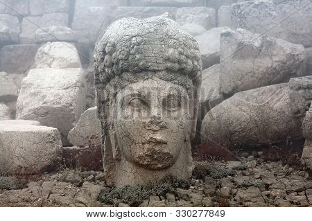 Ancient Stone Statues On The Top Of Nemrut Mount, Anatolia, Turkey. In 62 Bc, King Antiochus I Theos