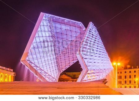 Poznan/poland - October 28, 2019: Fountain On Freedom Square In Poznan Is Illuminated At Night By St