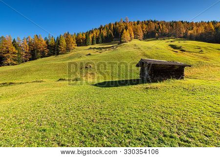 Autumn Rural Mountains Scene With Traditional Alpine Hut. Hiking In Austrian Alps, Tyrol, Austria.