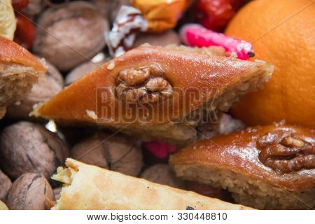 Baklava Is In The Background Xoncha . Isolated And Macro Shot Of Novruz Holiday Cookie Paxlava . Bax
