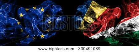 Eu, European Union Vs Seychelles, Seychelloise Smoke Flags Placed Side By Side. Thick Colored Silky 