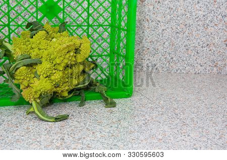 Fresh Cabbage Grade Romanesco In A Box On A Light Background