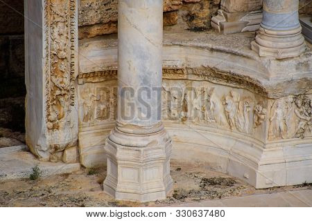 Bas-reliefs Of Antique Scenes On The Gables Of The Amphitheater In Hierapolis, Turkey. Ancient Antiq