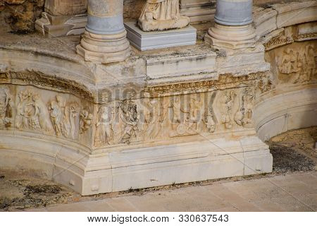 Bas-reliefs Of Antique Scenes On The Gables Of The Amphitheater In Hierapolis, Turkey. Ancient Antiq