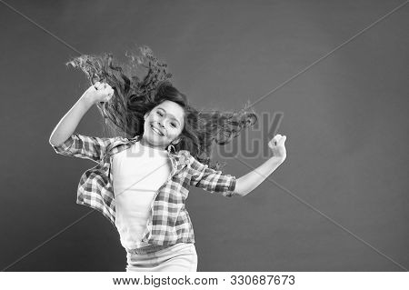 Going To Prom. Cute Small Girl With Wavy Prom Hairstyle On Red Background. Adorable Little Child Wit