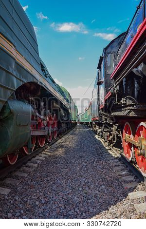 Between Cars Of Old Trains, Between Two Old Trains