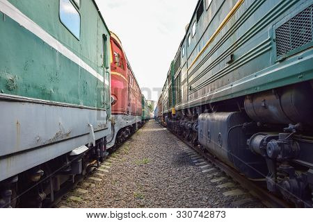 Between Cars Of Vintage Trains, Between Two Old Trains