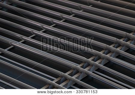 Angular View Closeuup Of Dark Metal Beams Structure In Fragment Of Building