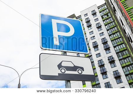 Ground View Of Roadsign Method Of Parking Vehicle Against Highrise