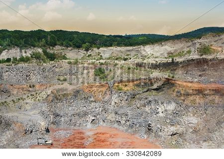 View On The Mining Quarry. Open Pit Ore Extraction