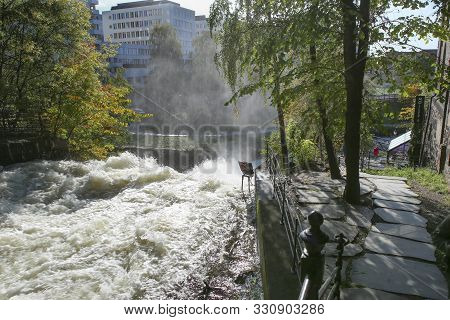 Waterfall Along The Akerselva River In Oslo, Norway.  Walking Path Along The River In City In Autumn