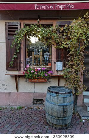 Kaysersberg, France, October 13, 2019 : Wine Store In A Kaysersberg Street. Kaysersberg Is One Of Th