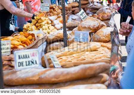 Asturias, Spain. 08-16-2021. Stall Of Various Types Of Bread In A Traditional Market In An Asturian 