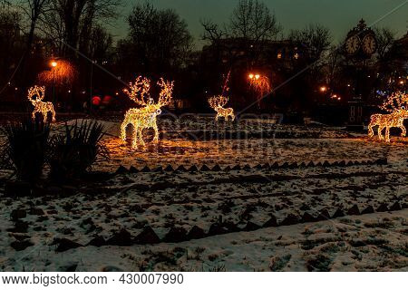 Christmas Decorations In The Gardens Of Cismigiu Park Located In Downtown Bucharest, Romania