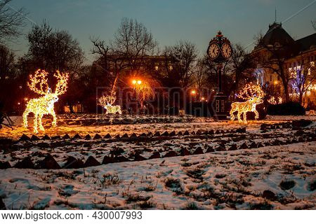 Christmas Decorations In The Gardens Of Cismigiu Park Located In Downtown Bucharest, Romania