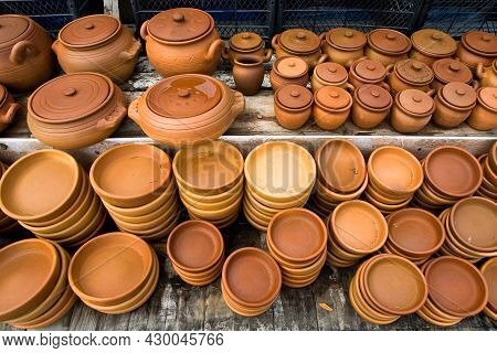 Earthenware Kitchen Utensils Are Sold In Georgia. Kitchenware.