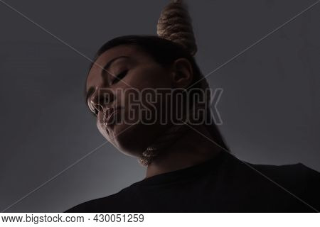 Depressed Woman With Rope Noose On Neck Against Grey Background, Low Angle View