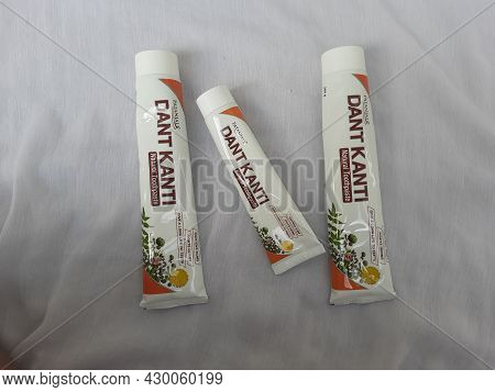 Closeup Of Patanjali Dant Kanti Natural Tooth Paste Free Germi X Hand Liquid Sanitizer Bottle Isolat