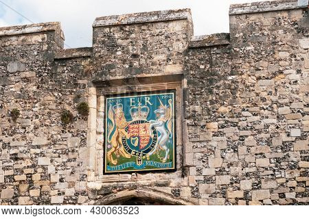 Winchester, United Kingdom, 10th August 2021:- A Royal Coat Of Arms Above A Gate In Winchester City 