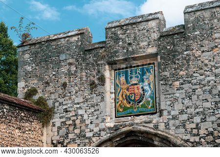 Winchester, United Kingdom, 10th August 2021:- A Royal Coat Of Arms Above A Gate In Winchester City 