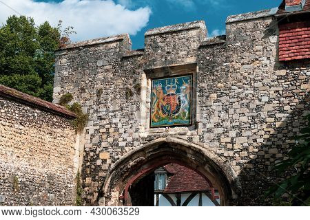 Winchester, United Kingdom, 10th August 2021:- A Royal Coat Of Arms Above A Gate In Winchester City 
