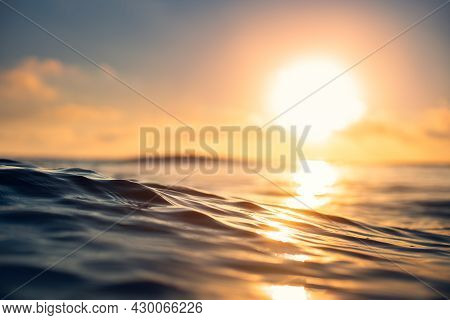 Ocean Wave Close Up, Low Angle View, Sunrsie Shot.