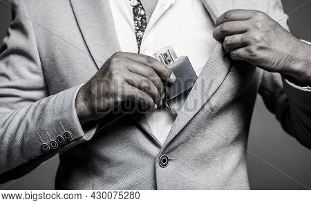 Fragrance Smell. Men Perfumes. Fashion Cologne Bottle. Man Holding Up Bottle Of Perfume. Men Perfume