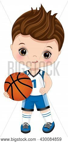 Cute Little Boy Wearing Blue And White Sport Outfit Playing Basketball. Little Boy Is Cute And Brune
