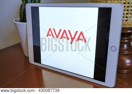 May 2021 Milan, Italy: Avaya Company Logo Icon Close-up On Tablet Screen In The Office. Avaya Illust