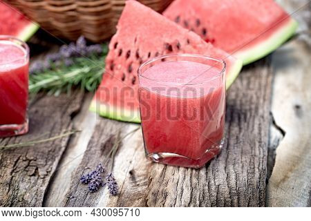 Watermelon Smoothie And Slices Of Watermalon On Table