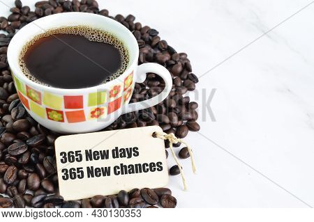 Coffee Beans, A Cup Of Coffee And Label Tag Written With 365 New Days, 365 New Chances