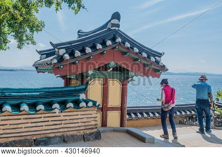 Seosan, South Korea; August 4, 2021: Tourists Standing Near Gate At Ganwoldo Island Ganworam Hermita