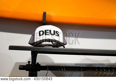 Bordeaux , Aquitaine France - 08 15 2021 : Deus Logo Brand And Text Sign On Cap Black White Fashion 