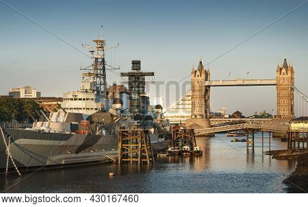 London/united Kingdom; 7/19/2014: Sunset View Of The River Thames In London With The Battleship Hms 