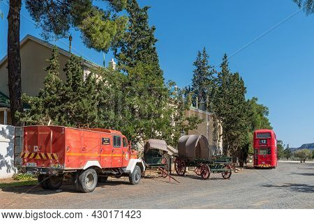 Matjiesfontein, South Africa - April 20, 2021: A Street Scene, With Vintage Vehicles, In The Histori
