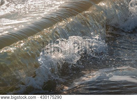Colored Sea Waves With Splashes And White Breakers In Circeo Park, Sabaudia, Italy