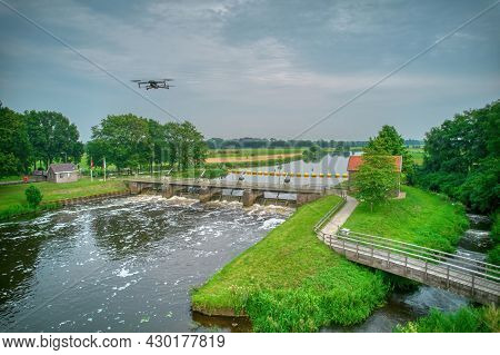 An Aerial View With Drone In The Background Above A Weir In The River Vecht In The Netherlands. Down