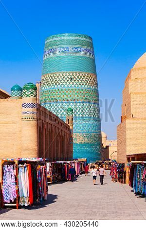 Kalta Minor Minaret At The Itchan Kala, The Walled Inner Town Of The City Of Khiva In Uzbekistan