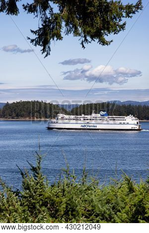 Victoria, Vancouver Island, British Columbia, Canada - August 8, 2021: Bc Ferries Boat Leaving The T