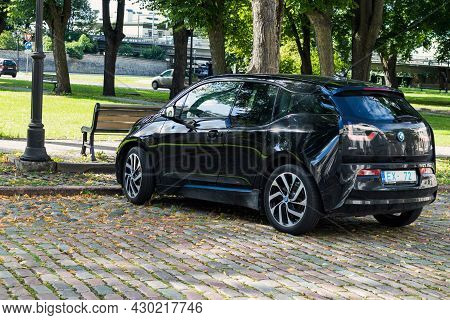 Bmw I3 Parked On A Paved Street. Black Bmw Electric Car. Riga, Latvia - August 15, 2021.